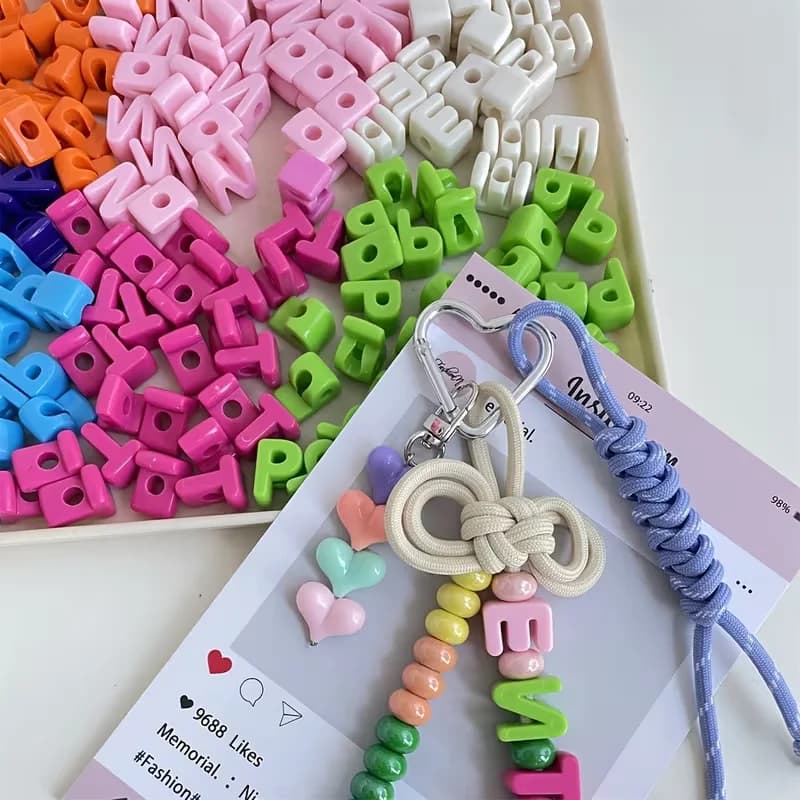 52 Pieces of Large-Hole Acrylic Beads, in Random Colors. Includes 26 Letters Each in 2 Pieces, with Accessories. image